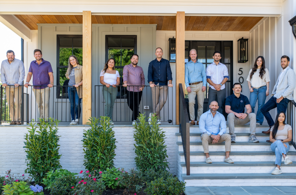 Executive team member at Design Pro Remodeling in branded attire